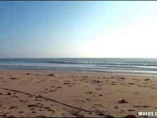 Deity is on the beach and has sex video there