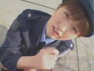 Japonsko ženska policaj fafanje